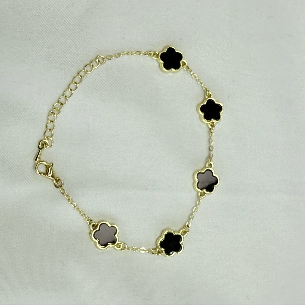 Elegant Gold and Black Flower Bracelet